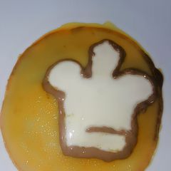 A picture of Cookpad logo Custard pan cake#cookpadnigeriais2.