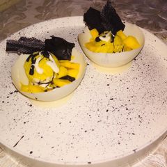 A picture of Mango Ice cream chocolate bowl.