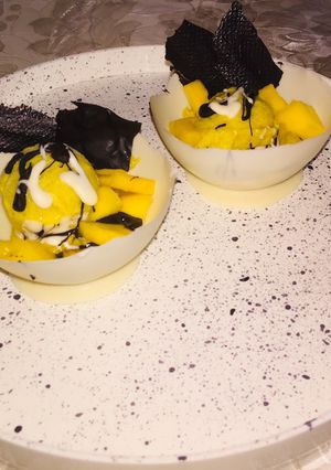 A picture of Mango Ice cream chocolate bowl.