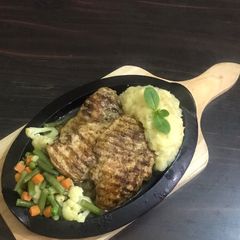 A picture of Black pepper chicken steak.