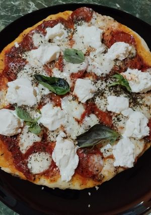 Foto di Pizza piccante e cremosa