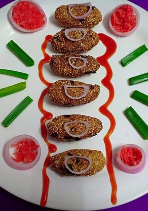 A picture of Bajra chop with carrot and spring onions flavor.