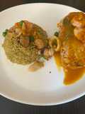 Pescado Relleno con Mariscos bañado en salsa de ají Amarillo