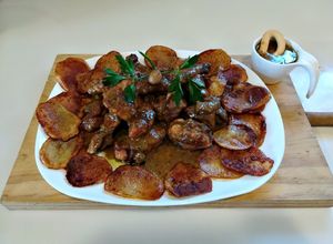 Foto principal de Conejo en salsa de almendras tostadas