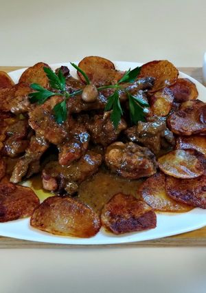 Foto principal de Conejo en salsa de almendras tostadas