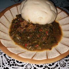 A picture of Pounded yam da miyar alyahu.(spinach).