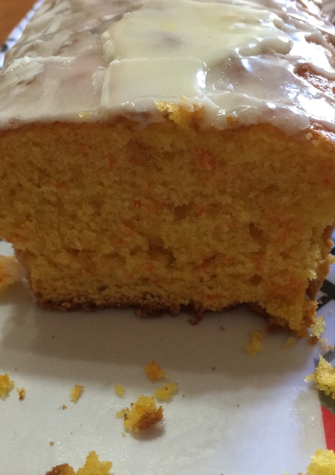 Una foto de Budín húmedo de naranja y zanahoria