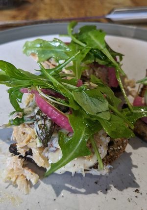 A picture of Crab + asparagus salad (on toast).