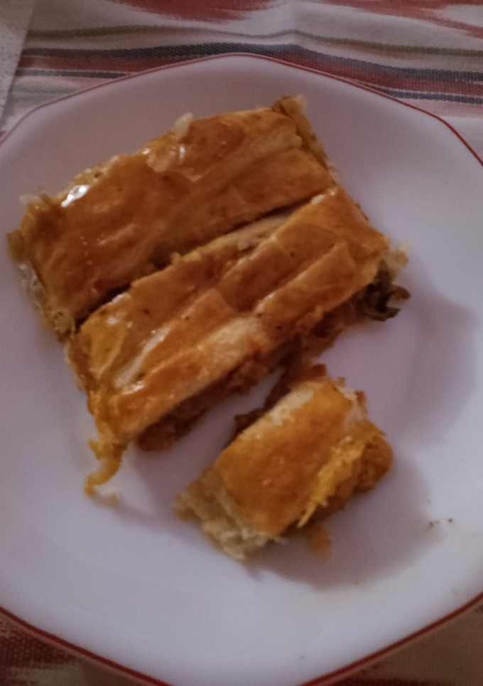 Una foto de Hojaldre de mejillones y pimientos