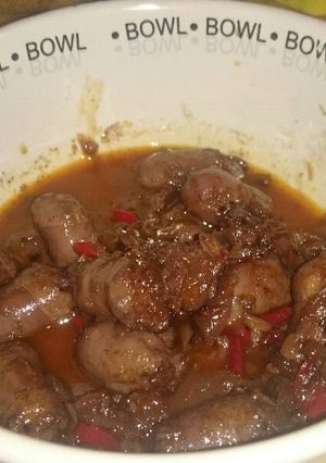 A picture of Chipolatas in Red Win Sauce.