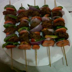 A picture of Sticked meat.