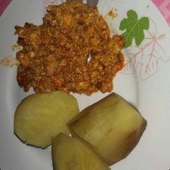 A picture of Sweet potatoes and egg sauce.