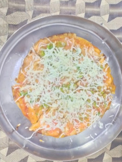 રોટી પિઝા(roti pizza recipe in Gujarati) રેસીપી મુખ્ય ફોટો