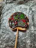 Manzana chupetin con chocolate