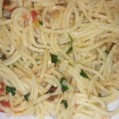 A picture of Spaghetti with tomato sauce.