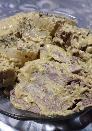Una foto de Lomo c/mayonesa de anchoas y aceitunas