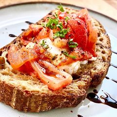 A picture of Caprese open-faced sandwich.