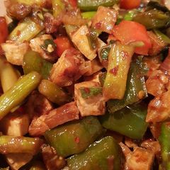 A picture of Tofu, peppers and asparagus spicy stir fry (chilli and basil).
