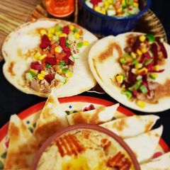 A picture of Shawarma with homemade hummus.