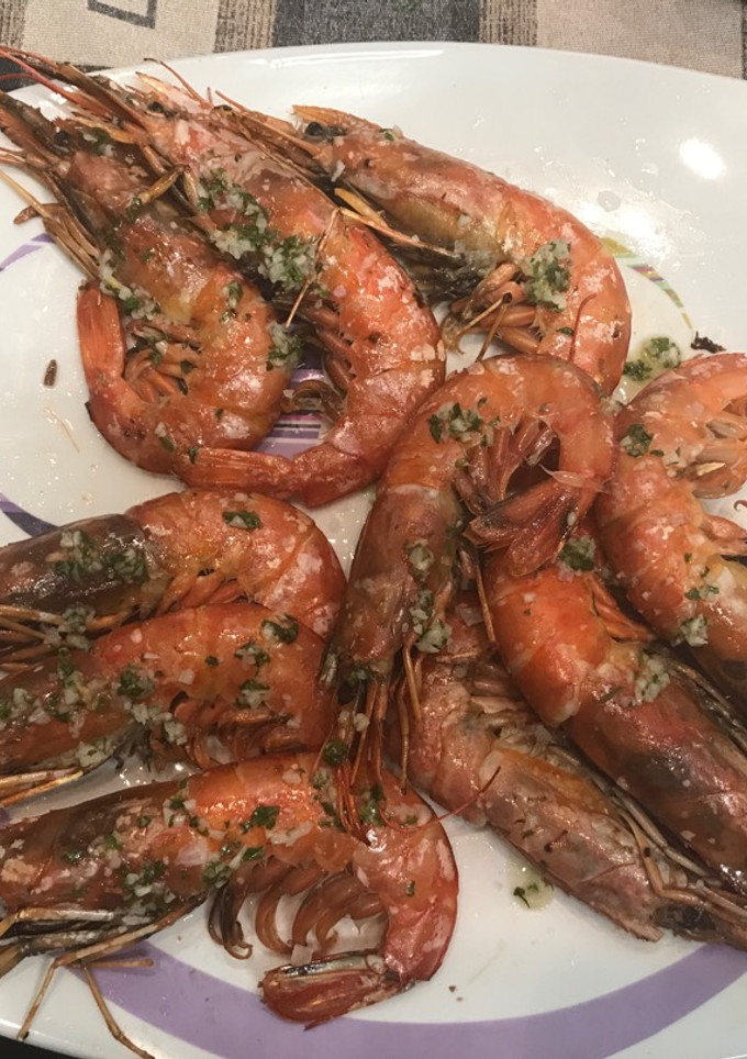 Una foto de Langostinos a la plancha
