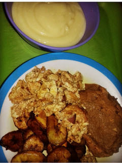 A picture of Moimoi, plantain and scrambled egg with pap.