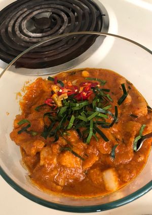 A picture of Panang Curry with Pork Belly.