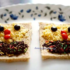 A picture of Open cheese chocolate sandwich.