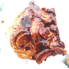 A picture of Lamb Chop In Caramelized Dang Gui Dark Sauce.