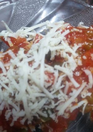 A picture of Jain/regular Besan and rice kebabs with salsa sauce.