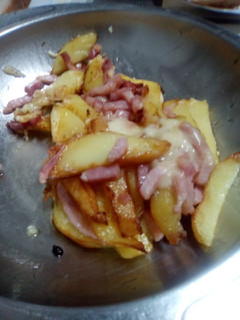 Una foto de Patatas, bacon y queso