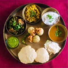 A picture of Sunday lunch thali 🍲.