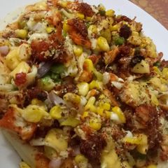 A picture of Chicken loaded pizza.