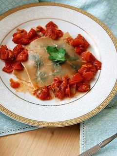 Foto di Ravioli aperti con pomodori e mozzarella di bufala