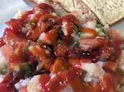 Una foto de ceviche de pepino