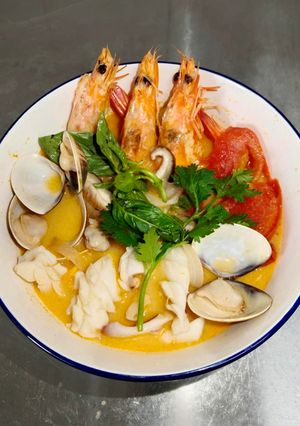 A picture of Tom Yum (Thai Hot and Sour Seafood Soup).
