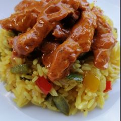 Nandos style Peri Chicken Strips and Spicy Rice A picture of Nandos style Peri Chicken Strips and Spicy Rice.