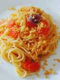 Spaghetti con acciughe, pomodorini