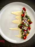 GNOCCHI ALLE ORTICHE PANCETTA CROCCANTE, POMODORINI CONFIT, RICOTTA SALATA