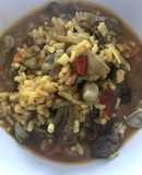 Arroz caldoso, con ternera, alcachofa y habitas