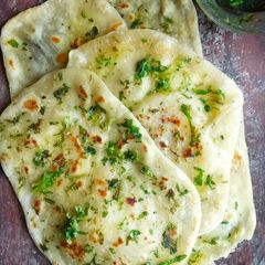 Herbed garlic butter naan A picture of Herbed garlic butter naan.