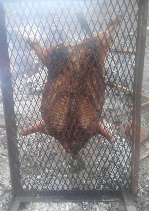 Una foto de Lechon a la parrilla