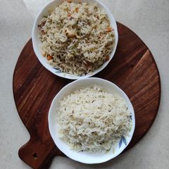 A picture of Veg fried rice and jeera rice.