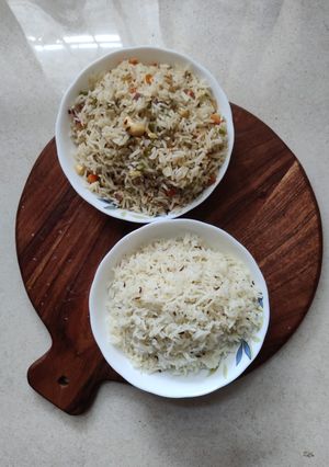 A picture of Veg fried rice and jeera rice.