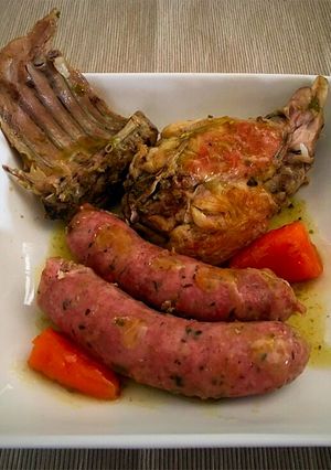 Una foto de Conejo con botifarra