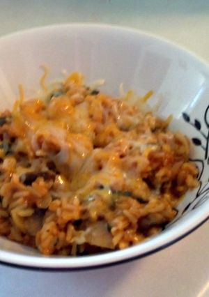 A picture of spinach and mushroom rice.