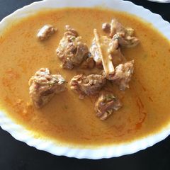 Mutton besan curd curry A picture of Mutton besan curd curry.
