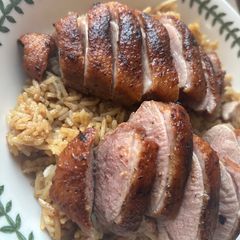 A picture of Crispy Duck Breast with Flavored Rice.