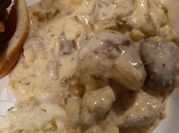 A picture of mashed potato with sour cream