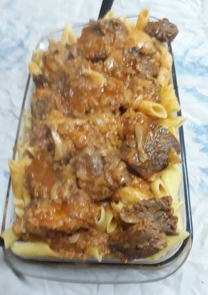 Una foto de Mostacholes con salsa de carne