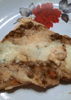 Una foto de Pizza con puré de berenjenas (3 sabores)